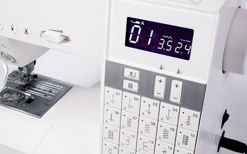 Janome Embla DC6030 Symaskin